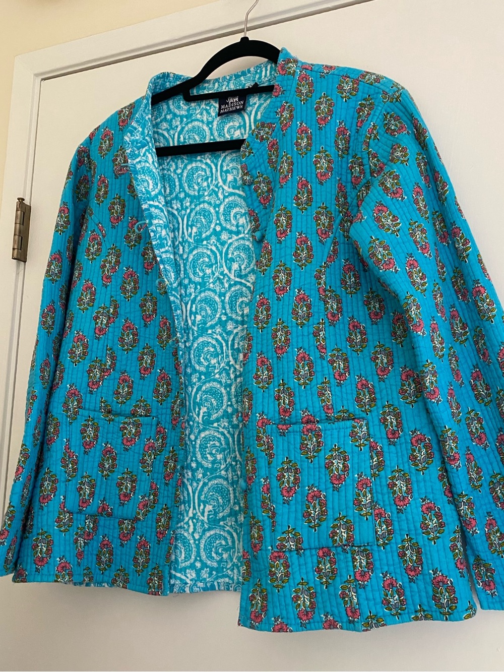 Madison Mathew’s Bright Teal Reversible Floral Open Blazer